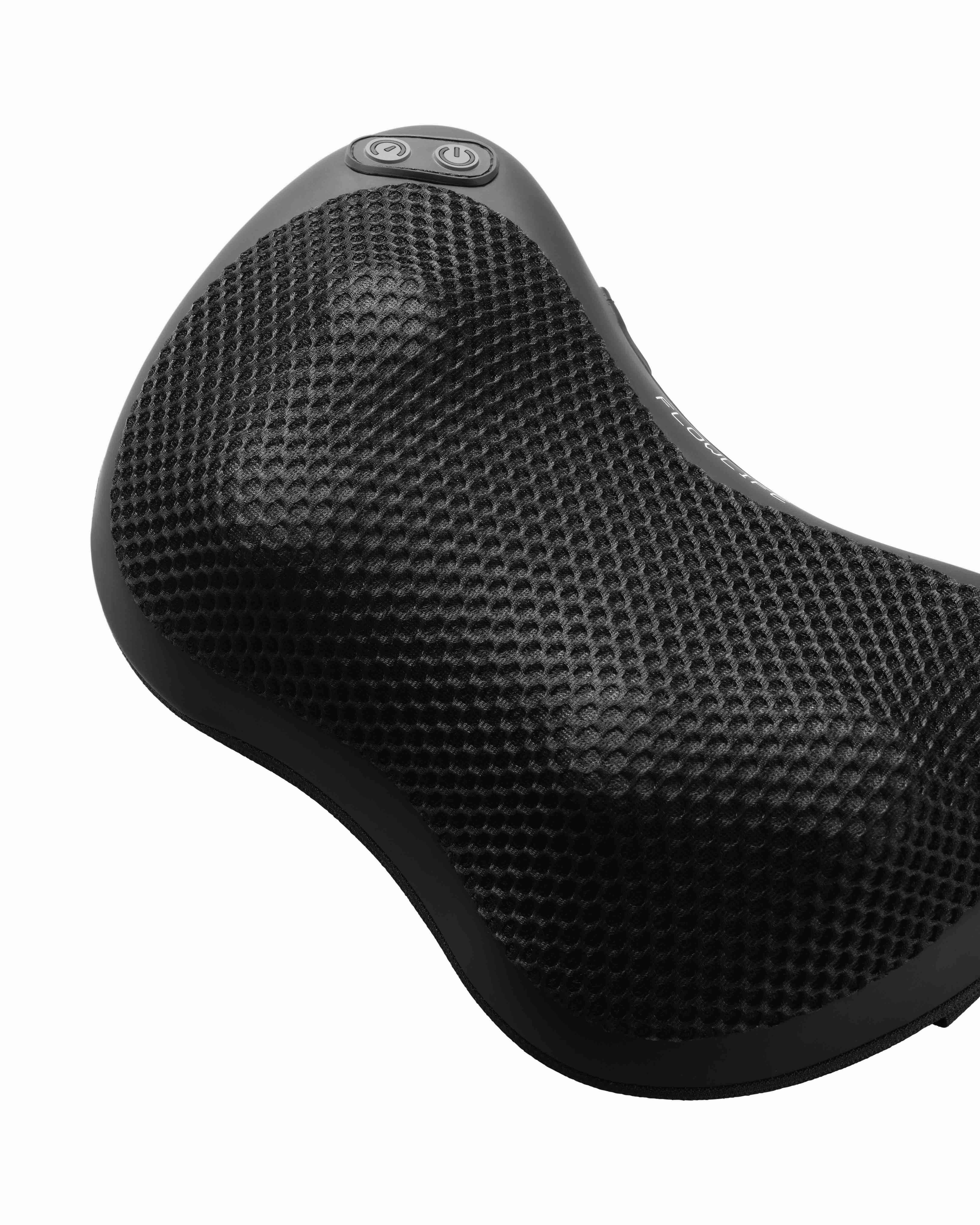 A detailed view of the black Flowpillow Heat massage pillow, focusing on its textured mesh surface and dual control buttons.