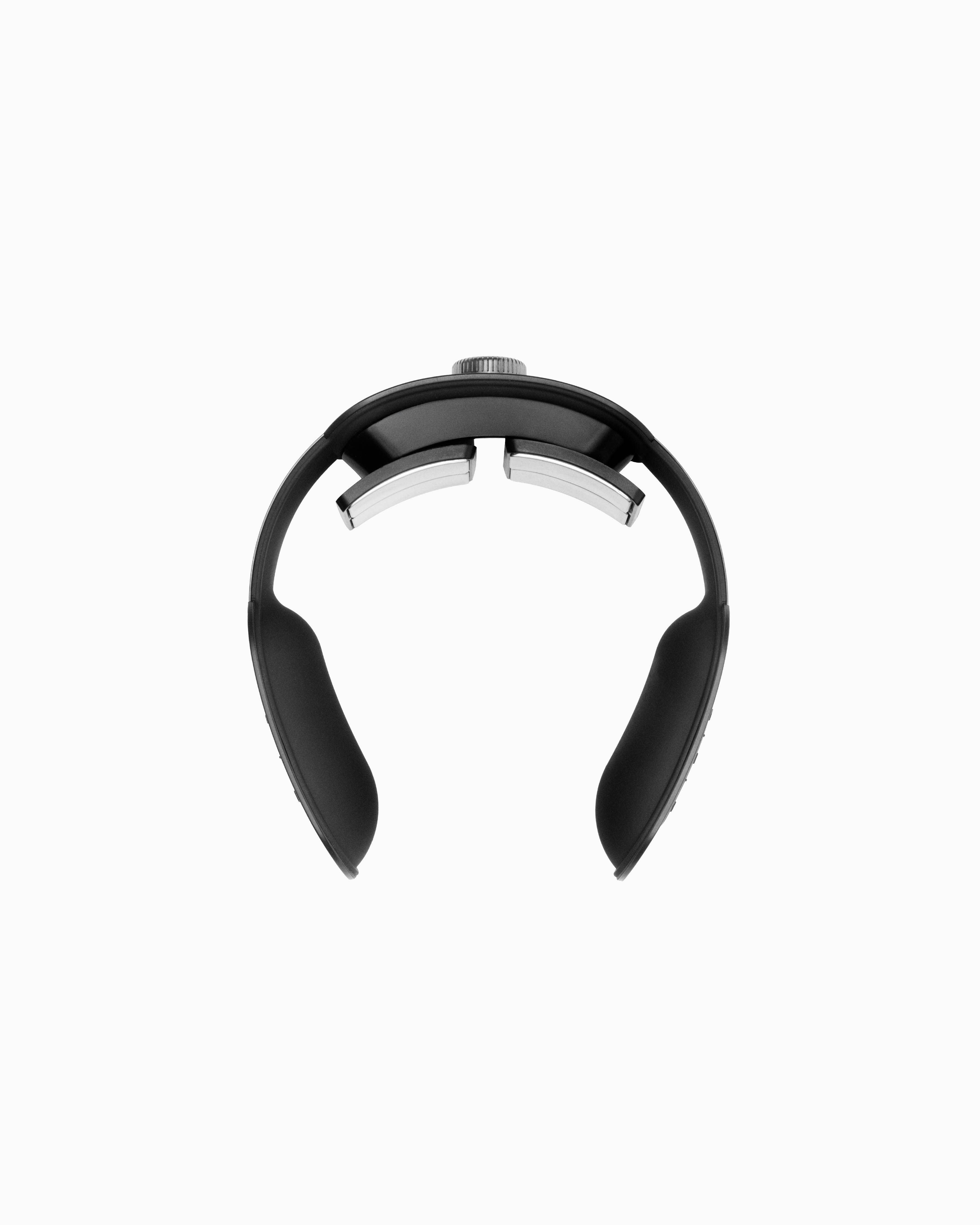 Black Flowtens Neck featuring silver contoured electrodes and an ergonomic design for targeted cervical recovery.