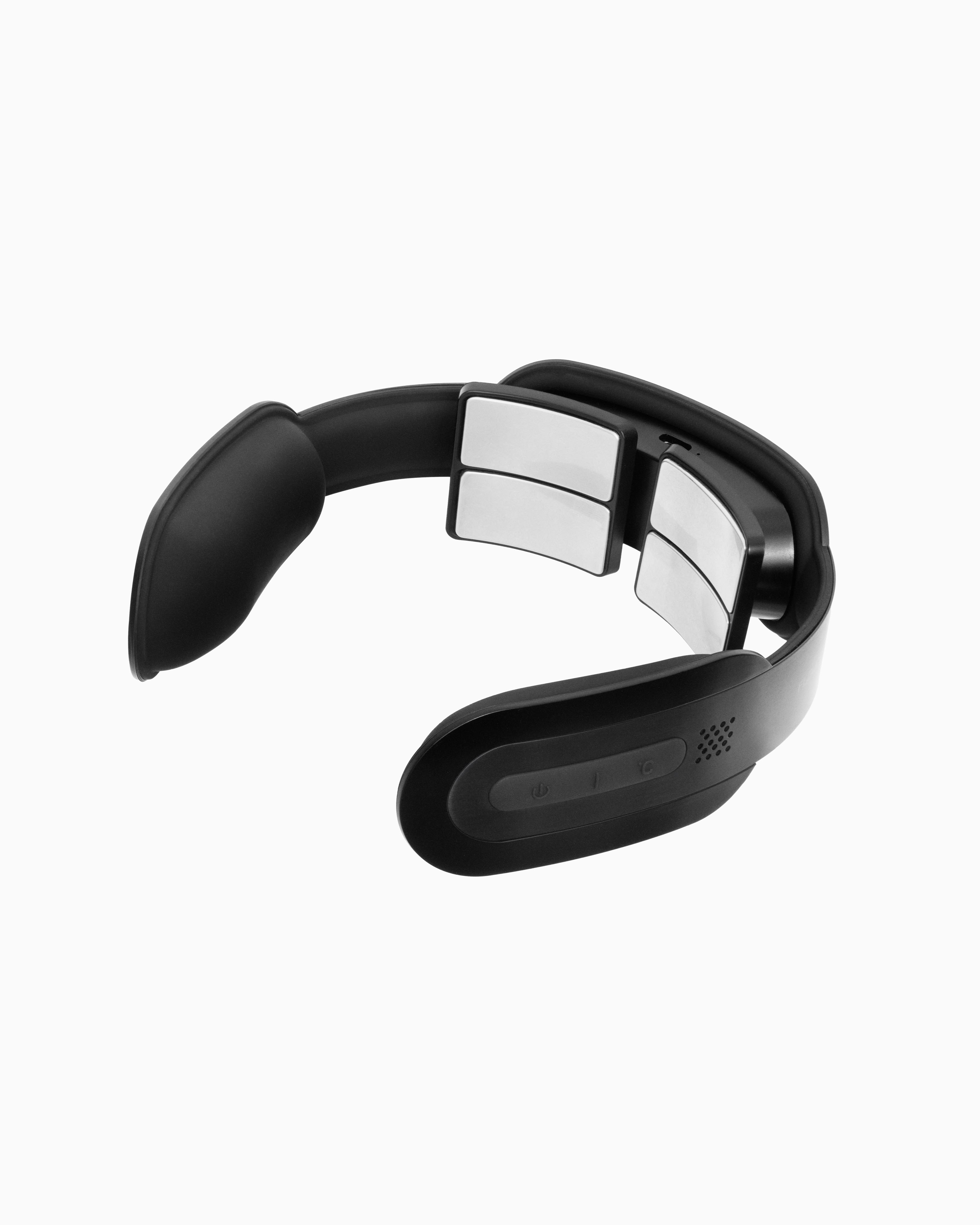 Black matte Flowtens Neck TENS device featuring silver contoured electrodes for targeted cervical muscle relief.