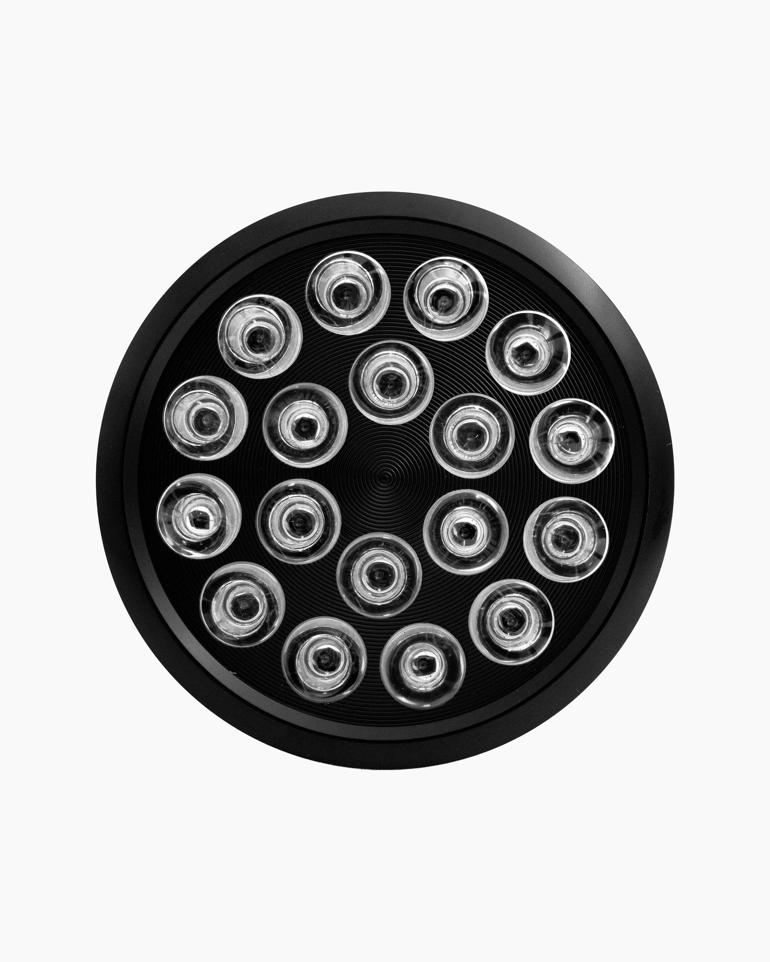 Front view of the Flowlight Bulb 50 Six Waves featuring eighteen clear LED lenses in a circular black housing.