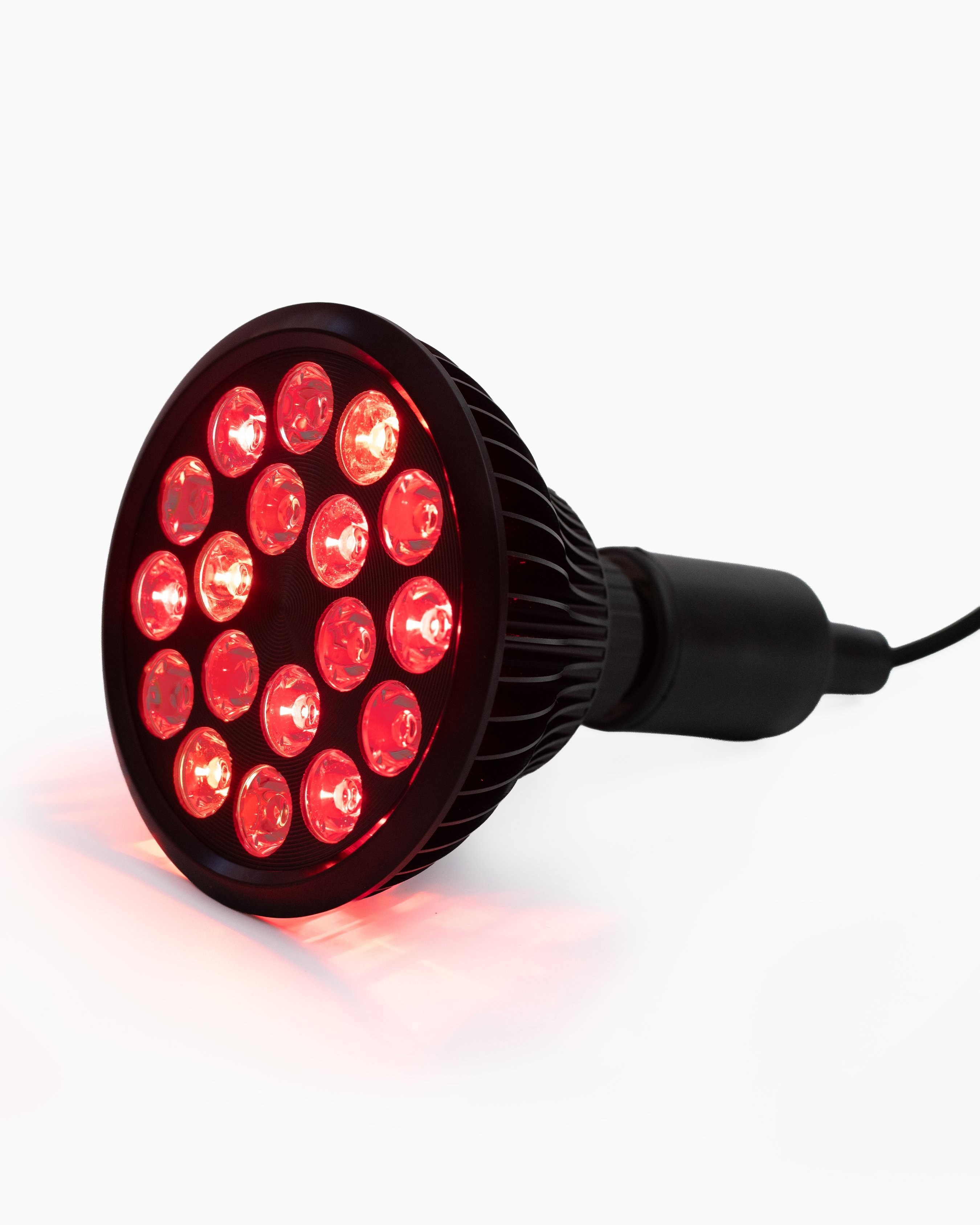 Black Flowlight Bulb 50 Six Waves featuring glowing red LEDs and a handheld socket for targeted red-light therapy.