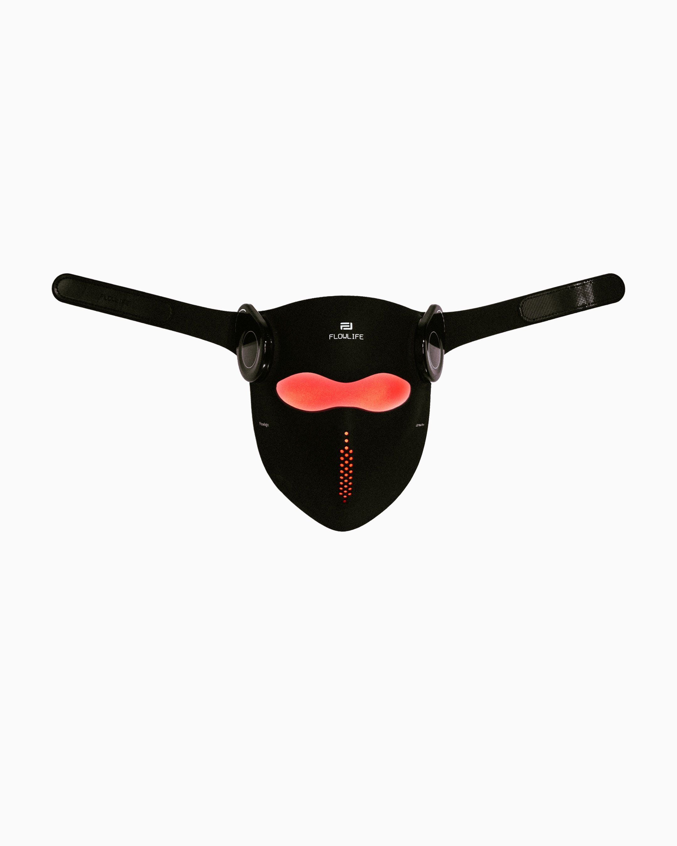 The Flowlight Laser Mask Ultra+ laid out from the front with its adjustable straps extended.